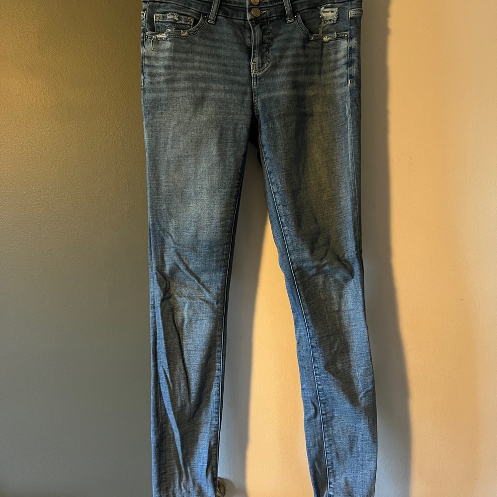 BKE Blue Skinny Jeans with Distressing and Faded Wash